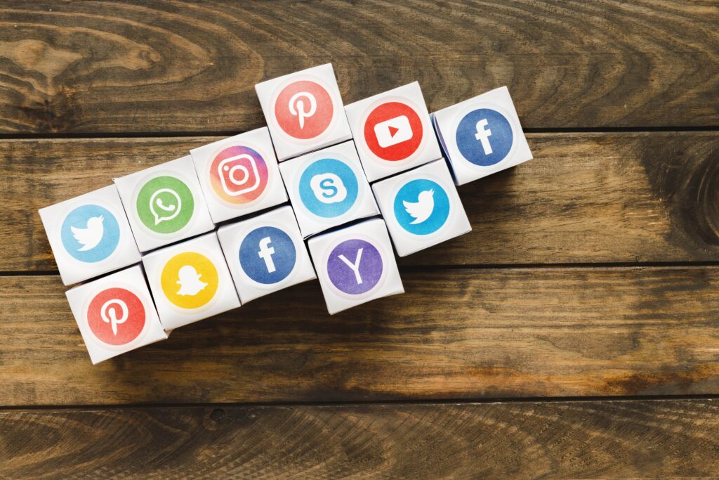 arrow made with boxes vivid social media icons wooden plank min